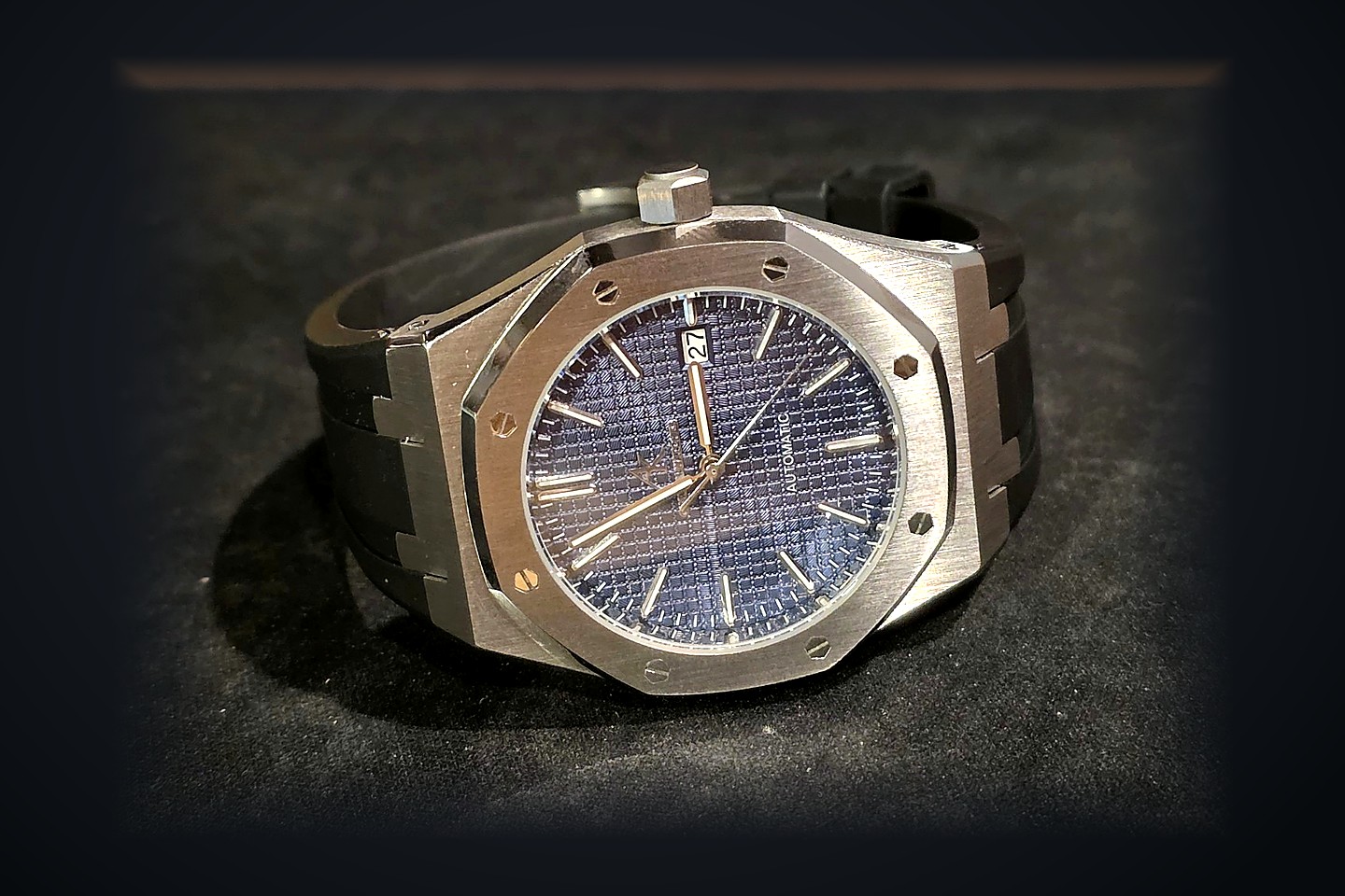 AK002 original watch, blue textured dial and black strap